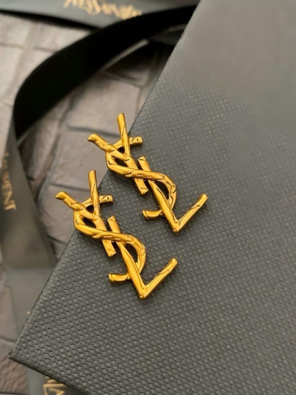 Saint Laurent twisted letter earrings